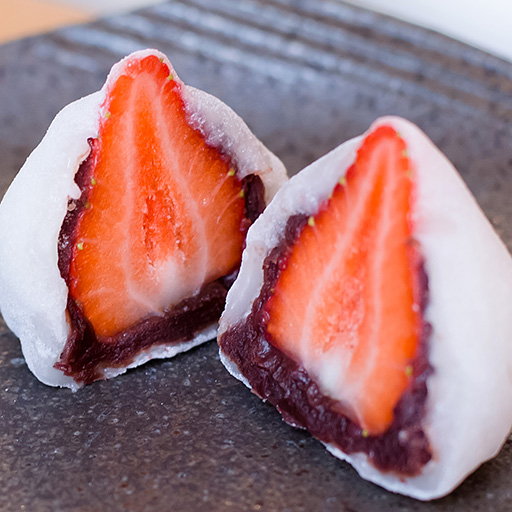 Ichigo daifuku — a whole strawberry with anko in soft mochi.