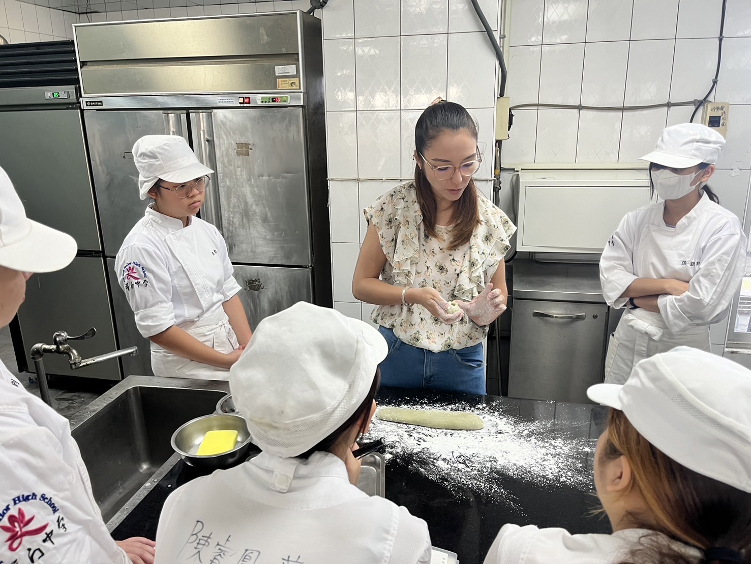 Emilie, demonstrating mochi with Taiwanese baking students