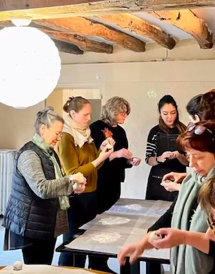 [Describe: e.g., 'Chef demonstrating lamination technique']